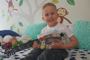Tymon z gitarą